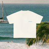 DEL TRÓPICO TEE - OFF WHITE